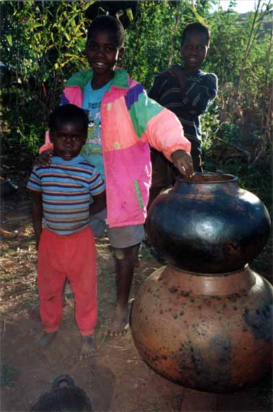 Photo of boys selling pots Photo of boys selling pots
