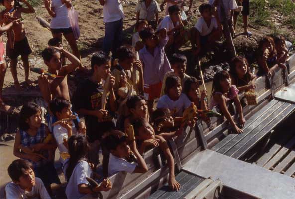 villagers crowding a boat photo villagers crowding a boat photo