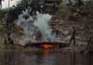 burning the canoe photo